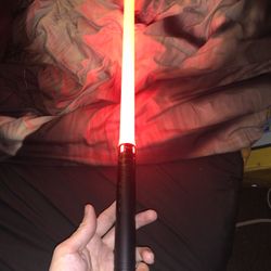 Lightsaber with metal flashlight color changing grip