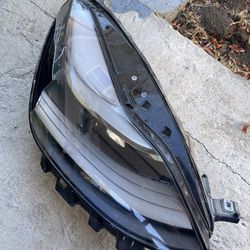 Tesla model 3 headlight passenger