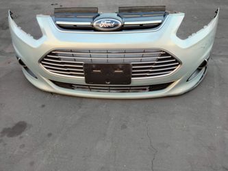 2013-2018 Ford C-Max complete front bumper with all the accessories OEM.