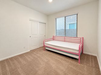 Pink Twin Daybed with Pop-Up Trundle + 2 Mattresses – $125