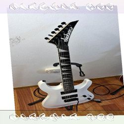 Shred Music with Premium Electric Guitar Options statement head