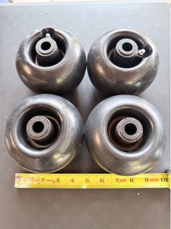 Mower deck wheels