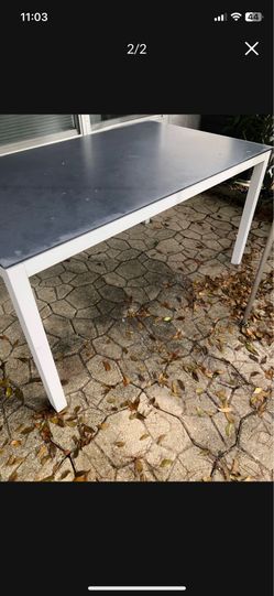 Patio or dining table. 69x35 glass & aluminum