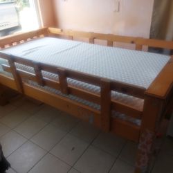 Twin size bed , foam mattress and wood frame