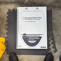 BRAND NEW IN BOX KOHLER SOFT CLOSE TOLIET SEAT