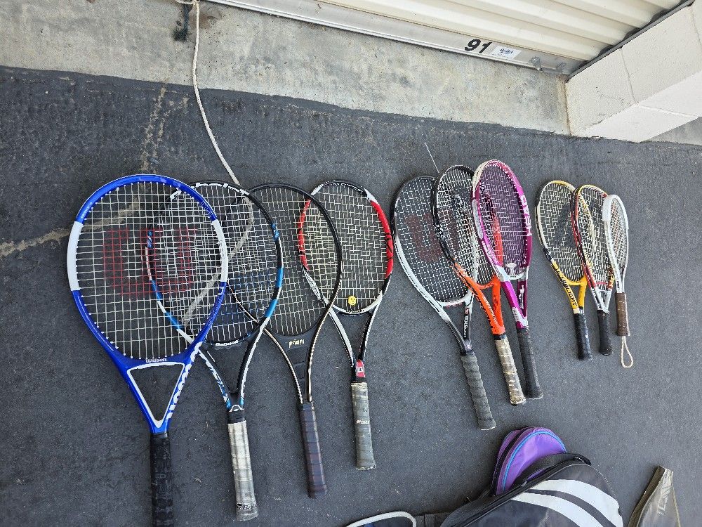 TENNIS RACKETS .