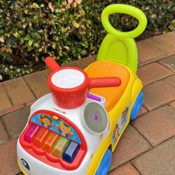 Fisher-Price Little People uhMusic Parade Ride-On