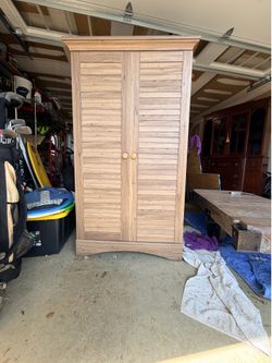 Coastal gray oak louvre door cupboard.  Free to a good home. Curb pick up