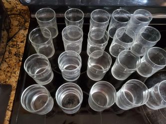 A set of 20 glass cups