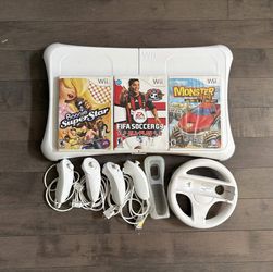 Nintendo Wii Accessory & Game Bundle - Balance Board, 4 Nunchuks, Wheel, 3 Games