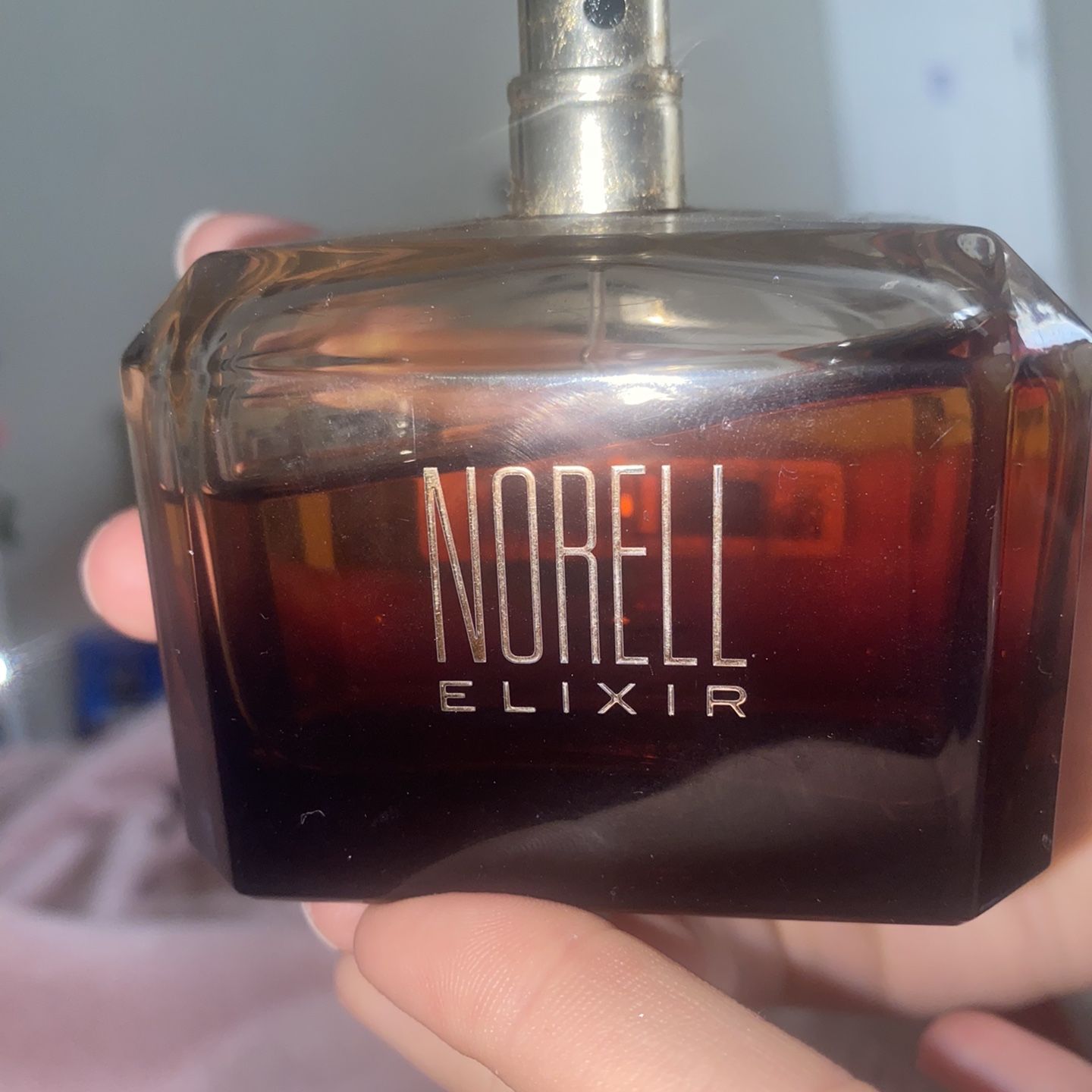 Norell elixir perfume sales