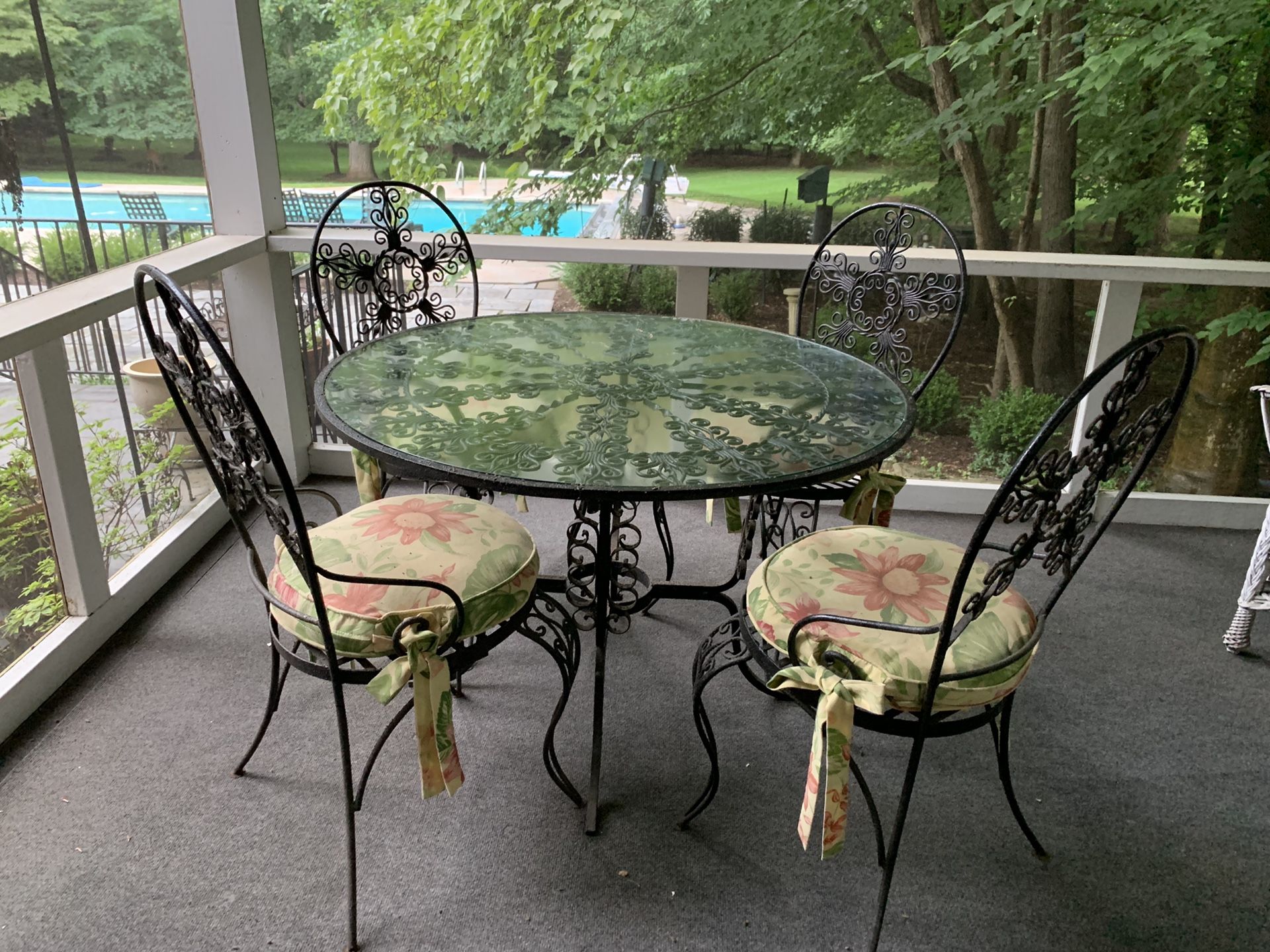Wrought Iron round table with four chairs