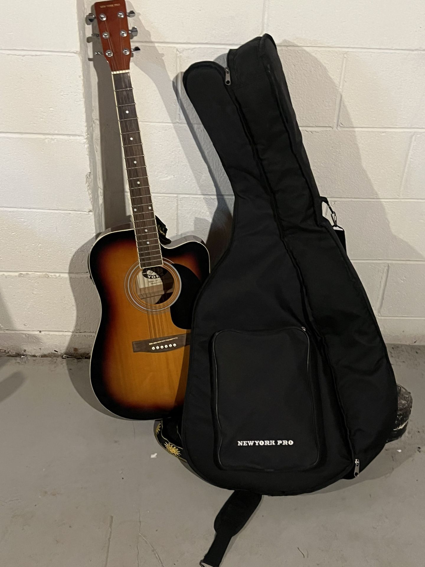New York Pro Dreadnought Acoustic Electric Guitar Sunburst Great Player and soft guitar case and guitar strap.