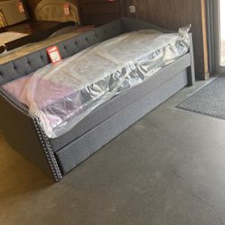 Day bed with mattress is 588 brand new, grab and go gray fabric