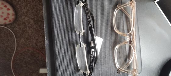 Ray ban and Versace glasses