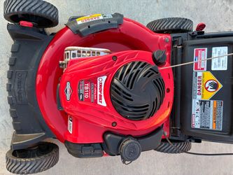 Lawnmower, troy Bilt push lawnmower starts right up runs perfect. Very little use.
