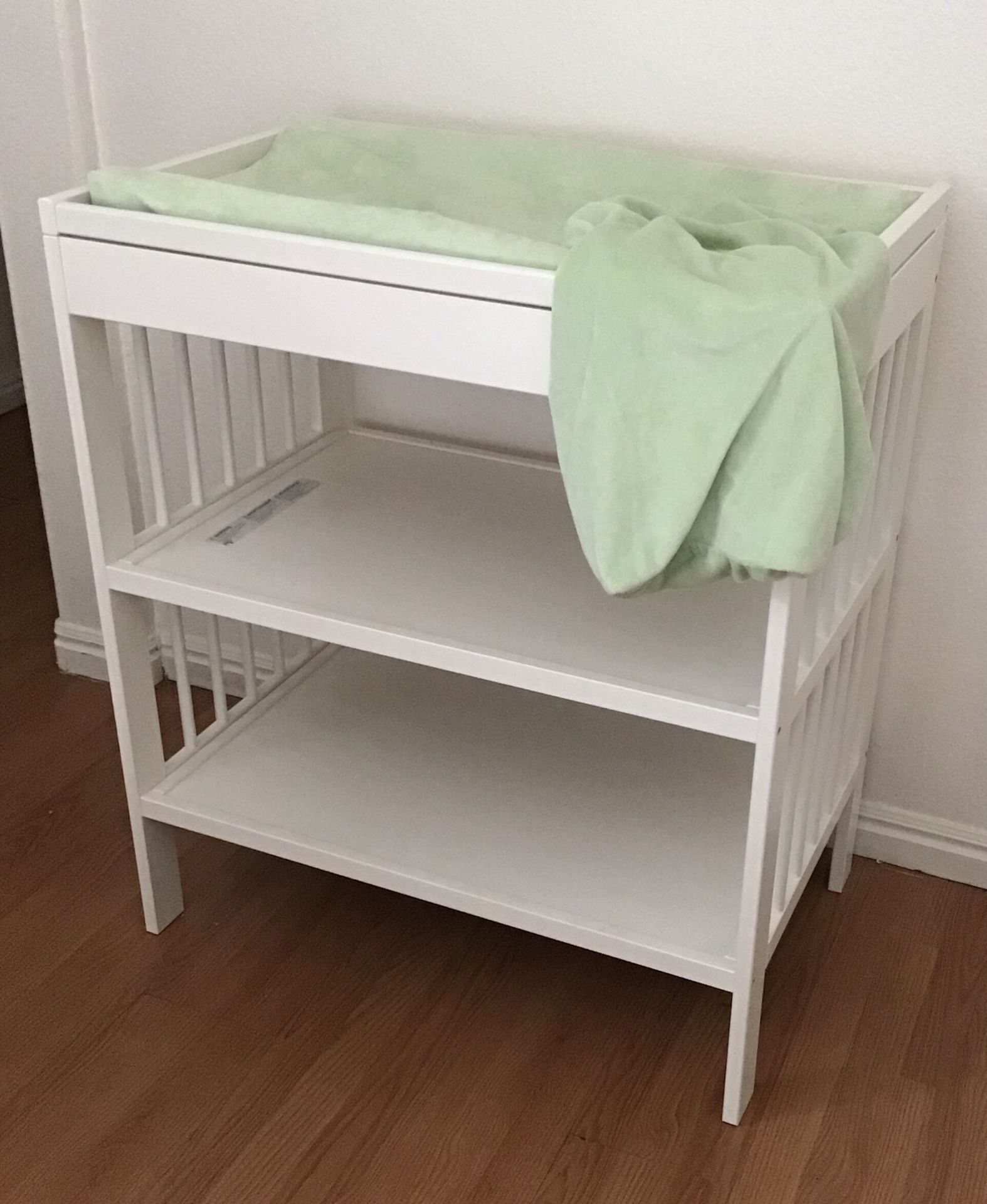Changing table with pad and covers