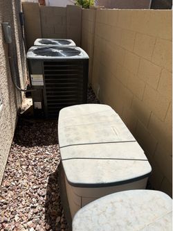 3 Rubbermaid outdoor storage bins. One medium and two small