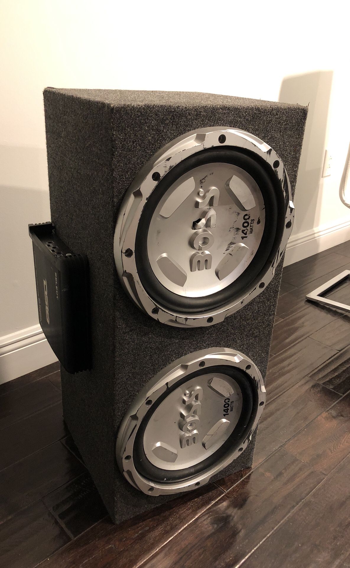 2 12” Boss subwoofers with box and 1000 watt amp