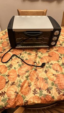 DeLonghi EO-1251 Multi-Function Broil/Toast/Bake Table Top Convection Oven