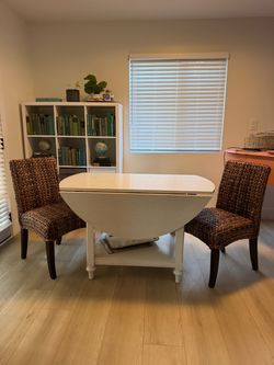 White Drop-Leaf Dining Table with 2 Wicker Chairs