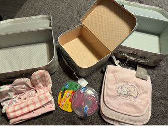 Baby shower gifts and mat. Nesting storage boxes