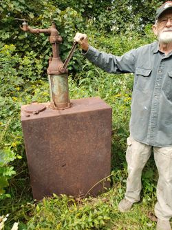 Antique Tank With Hand Pump
