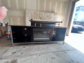 Tv stand with fireplace