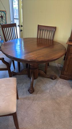 48” Round Oak Claw Foot Table w/ 2 - 24” leaves