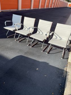 White Cantilever Chairs