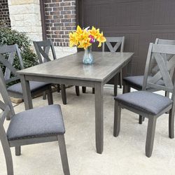 Beautiful Grey Table Set With 6 Matching Chairs 