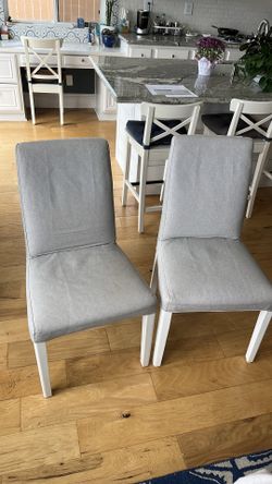 2 IKEA padded dining room chairs