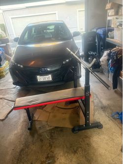 Bench rack with two 20 pound dumbbells