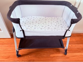 Dark grey bedside bassinet