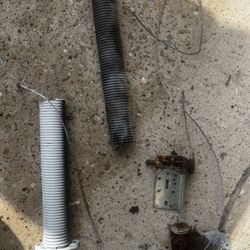 GARAGE DOOR SPRING REPLACED FREE STIMATED