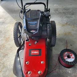 Toro Walk Behind String Mower.