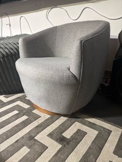 Set of two modern grey swivel chairs