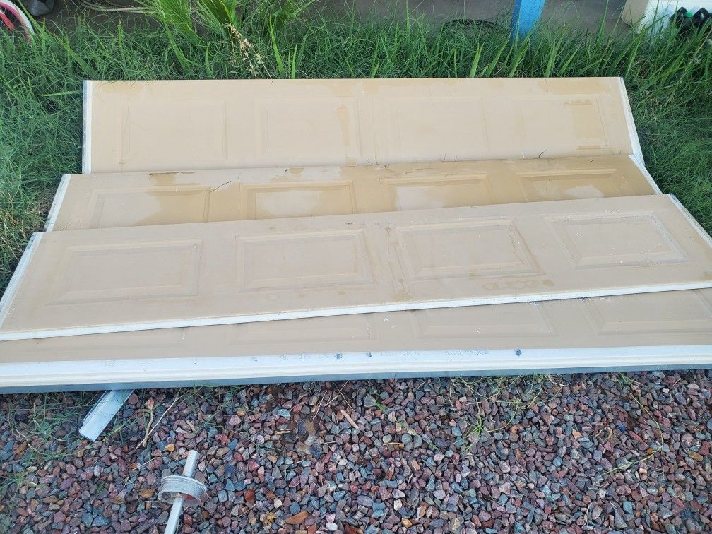 Garage Doors Installed, 8 And 9 Ft Wide X 7 Ft Tall.