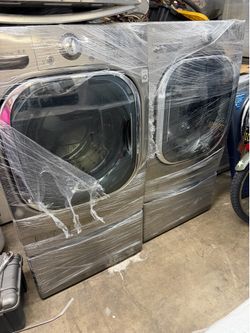 LG Grapphite steel washer and gas dryer front load with pedestal