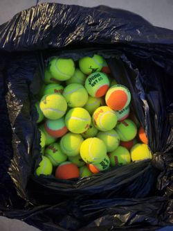 300-400 TENNIS BALLS USED