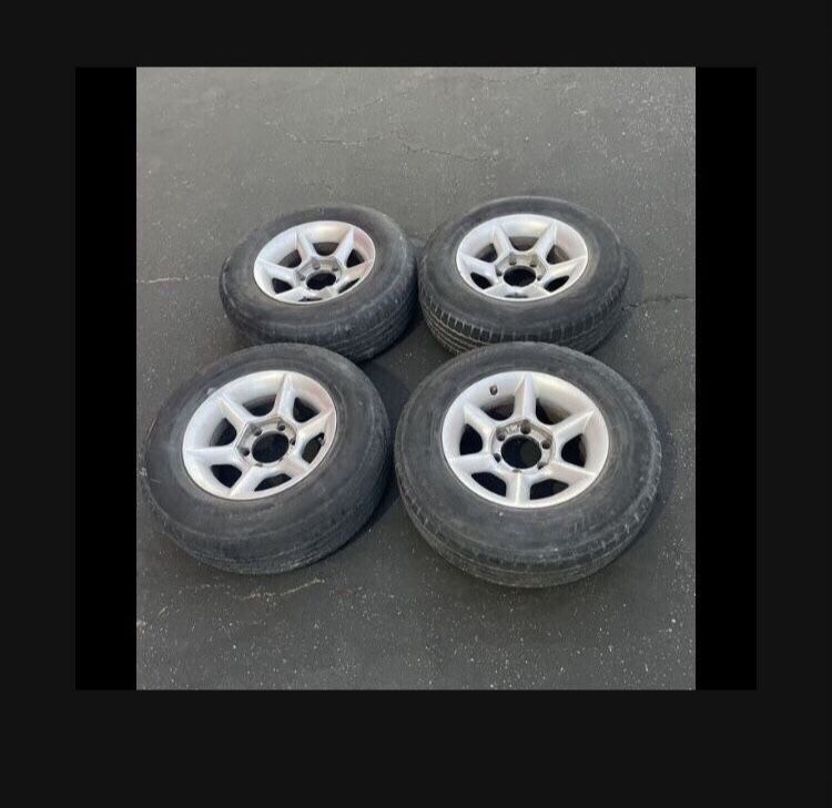 4 X 215/75r15 6x5.5 6x139.7 4Runner Tacoma  Stock  Rims With Tires!!!!