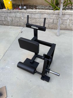 Legend Fitness plate loaded standing hamstring machine