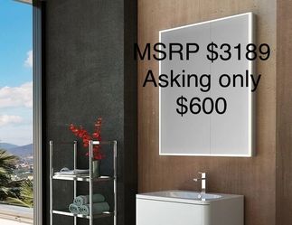 (is a 30″ x 36″ double-door (bi-view) LED-lighted vanity mirror medicine  cabinet from Fleurco's Luna / Halo Collection.