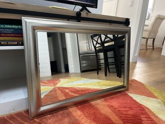 Elegant silver framed mirror 24 by 35.5