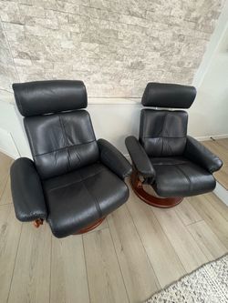 Pair of Black Leather Swivel Recliner Chairs