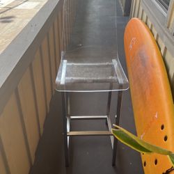 2 acrylic chairs