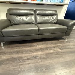 Two Leather Couches from Rooms To GO