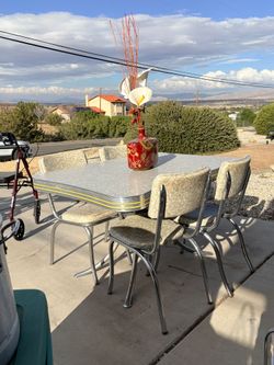 Vintage table with 4 chairs good condition