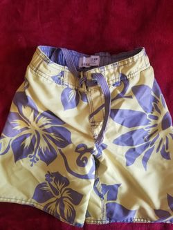Old navy swimming shorts. Gap kids shirt.