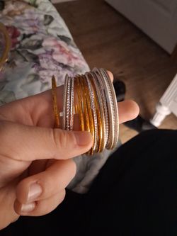 15 gold and silver bracelets
